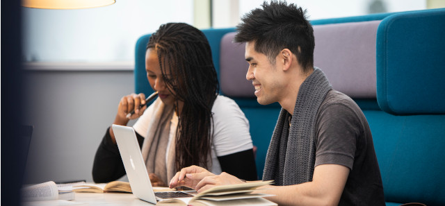 Students studying together in the library